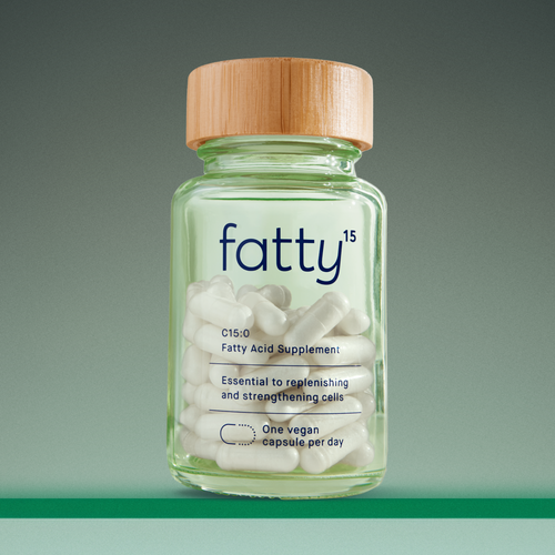 Fatty15's C15 supplement in a glass bottle with capsules.