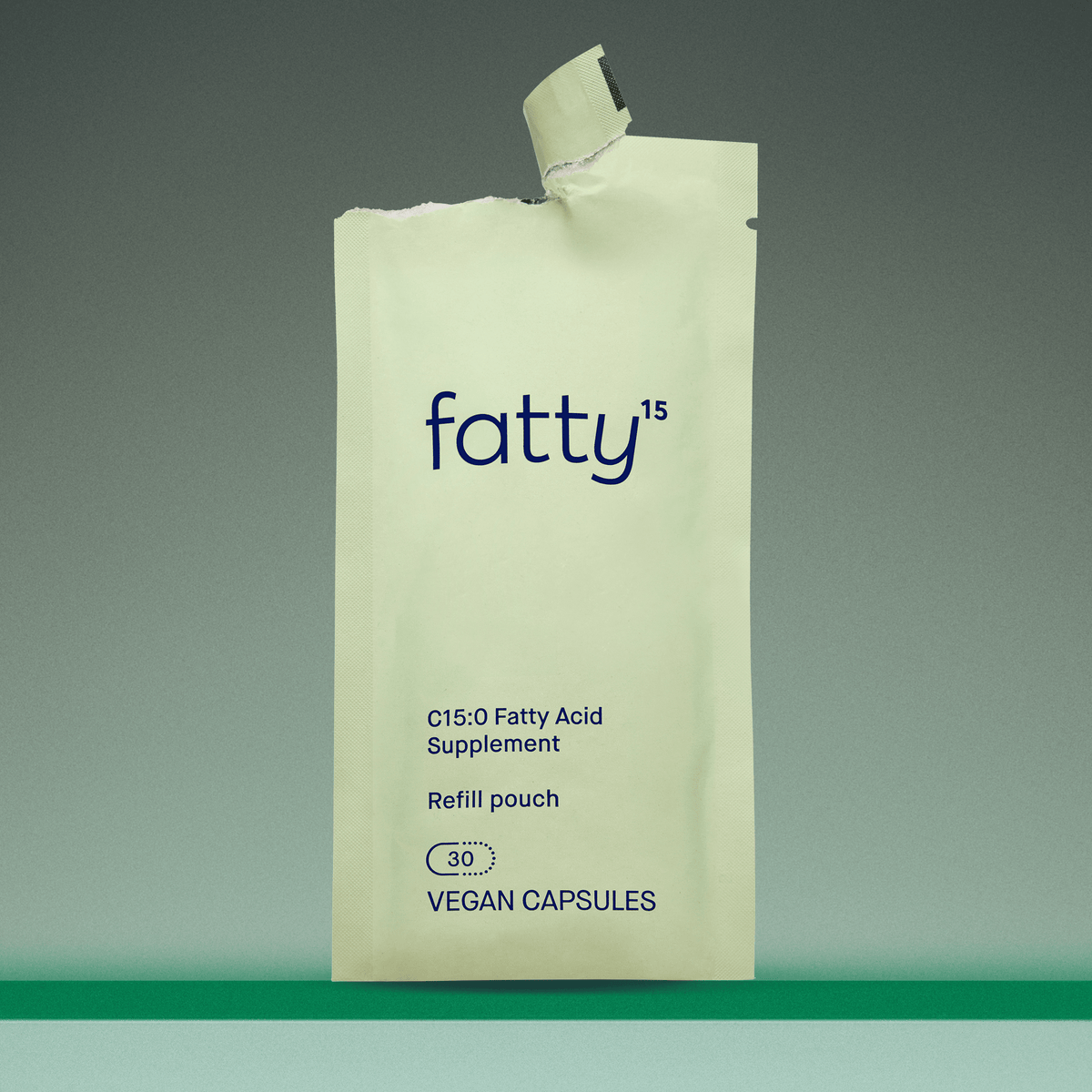 
                Fatty15&#39;s C15 supplement packaging on green background.