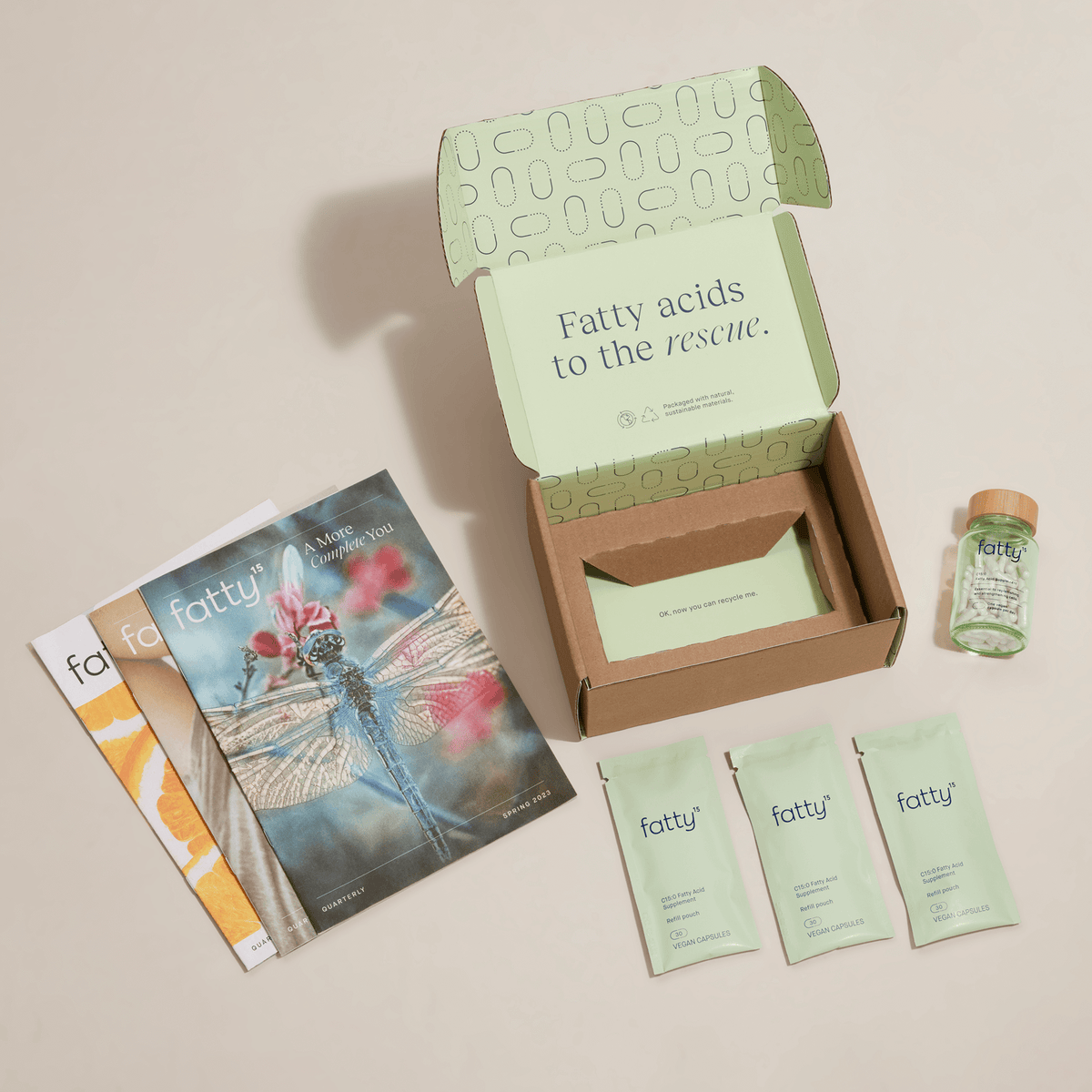 
                Fatty15 C15 supplement box with sachets and brochure.